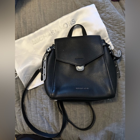 Women’s black leather Micheal Kors backpack purse